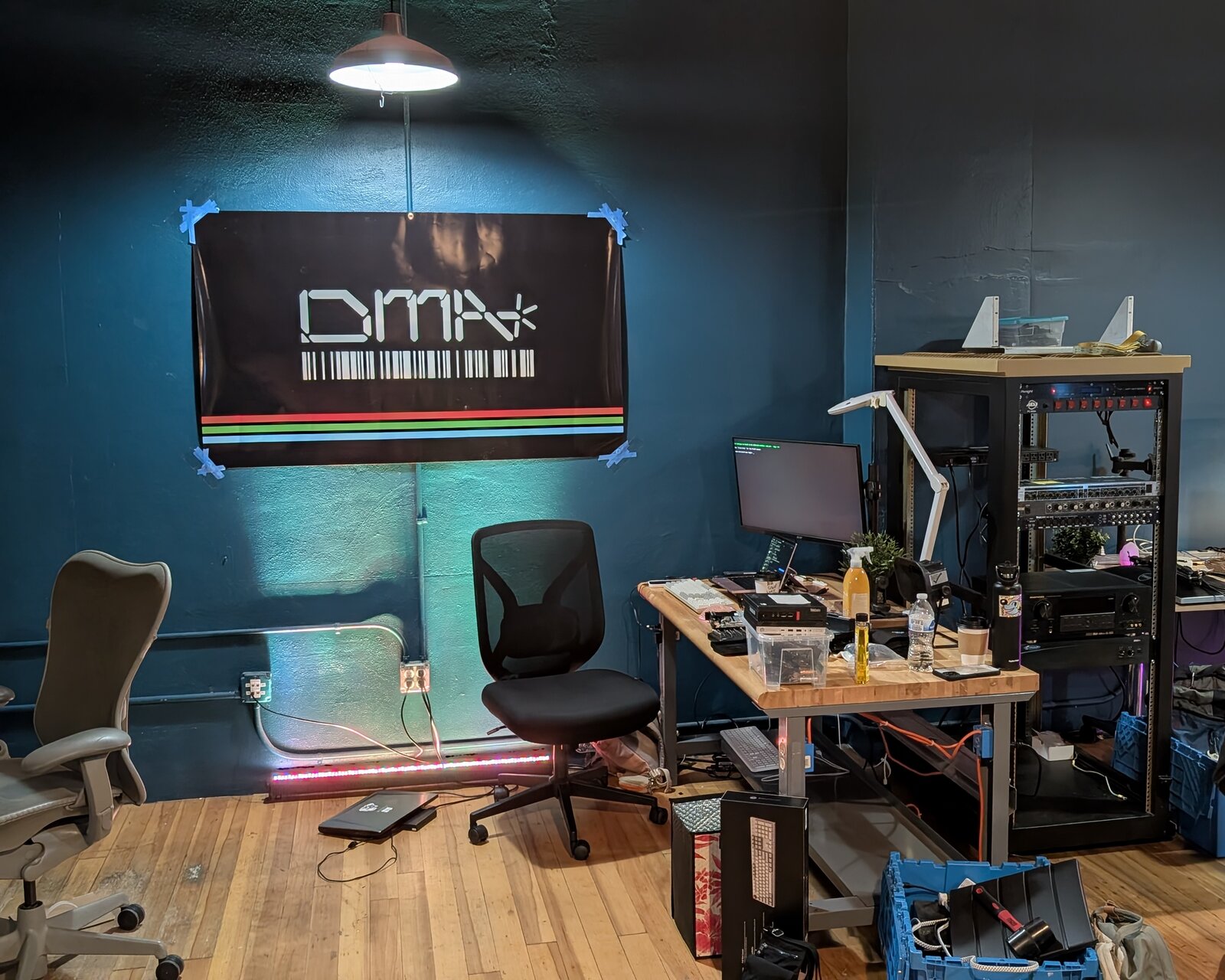 The workbench area at dma.space, our banner in sight.